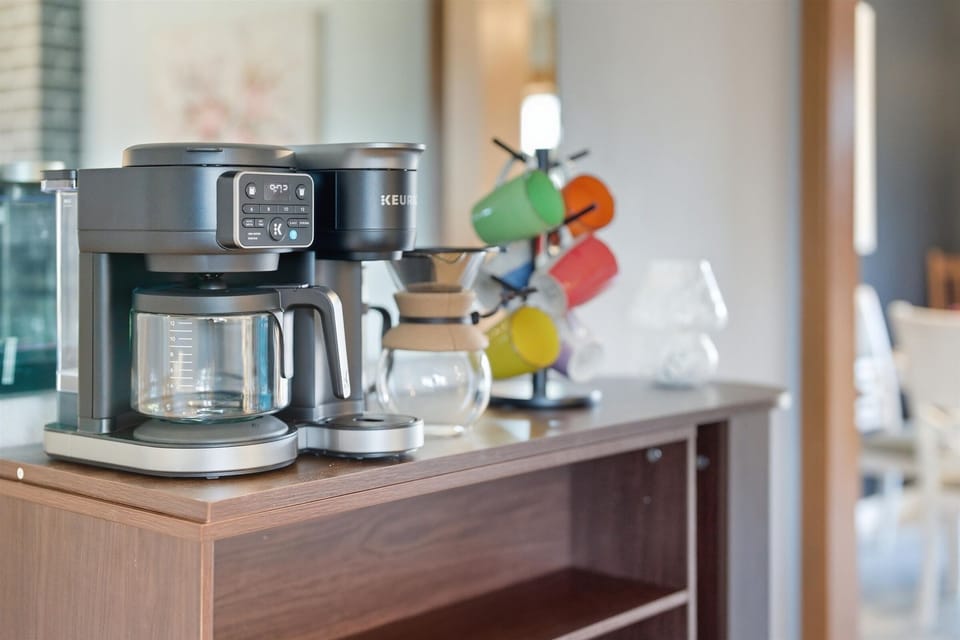 A dedicated coffee station helps everyone start the day on their own schedule, whether you prefer a quick cup or a slow morning brew.