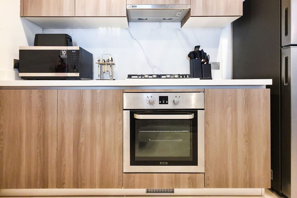 Enjoy the convenience of modern appliances and ample space to cook and dine