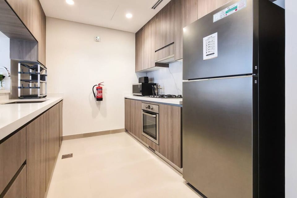 Enjoy the convenience of modern appliances and ample space to cook and dine