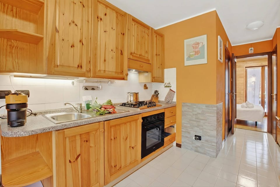Standard Apartment, Multiple Bedrooms (Station Inn Oulx) | Private kitchen | Fridge, microwave, oven, stovetop