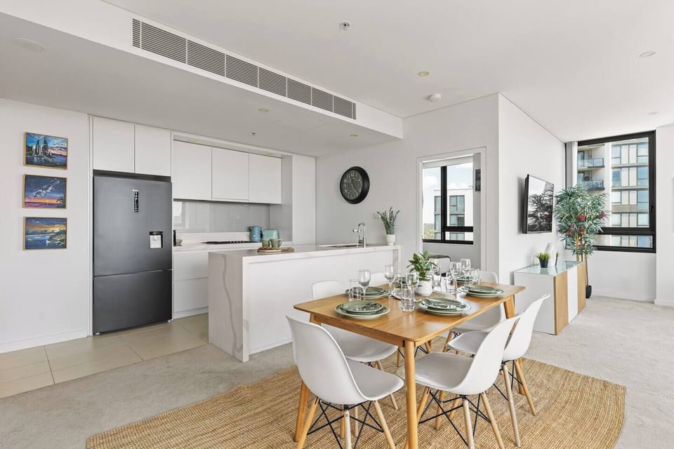 The fully equipped kitchen offers everything needed for extended stays, family meals, or entertaining guests.
