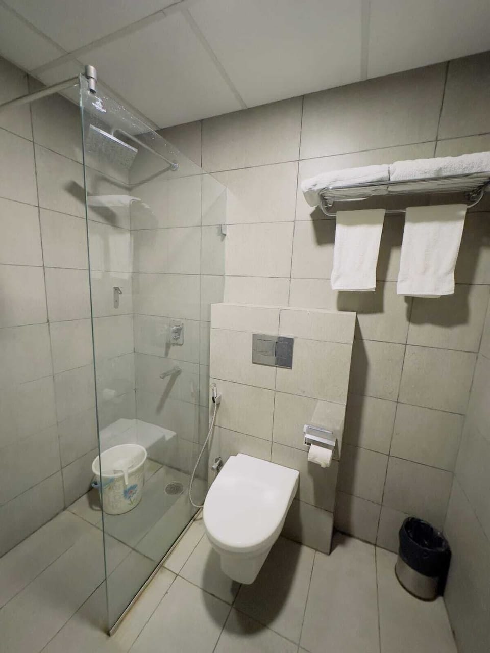 Shower, slippers, towels, soap
