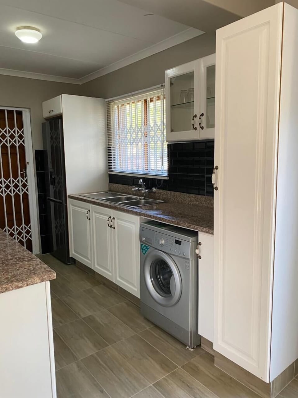 Deluxe Apartment, Patio, Garden View | Private kitchen | Full-size fridge, microwave, oven, stovetop