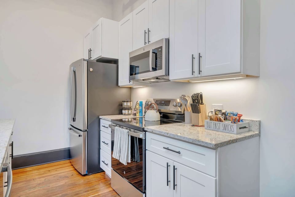 The spacious kitchen is set up to meet all your cooking and dining needs, including a full size dishwasher. 
