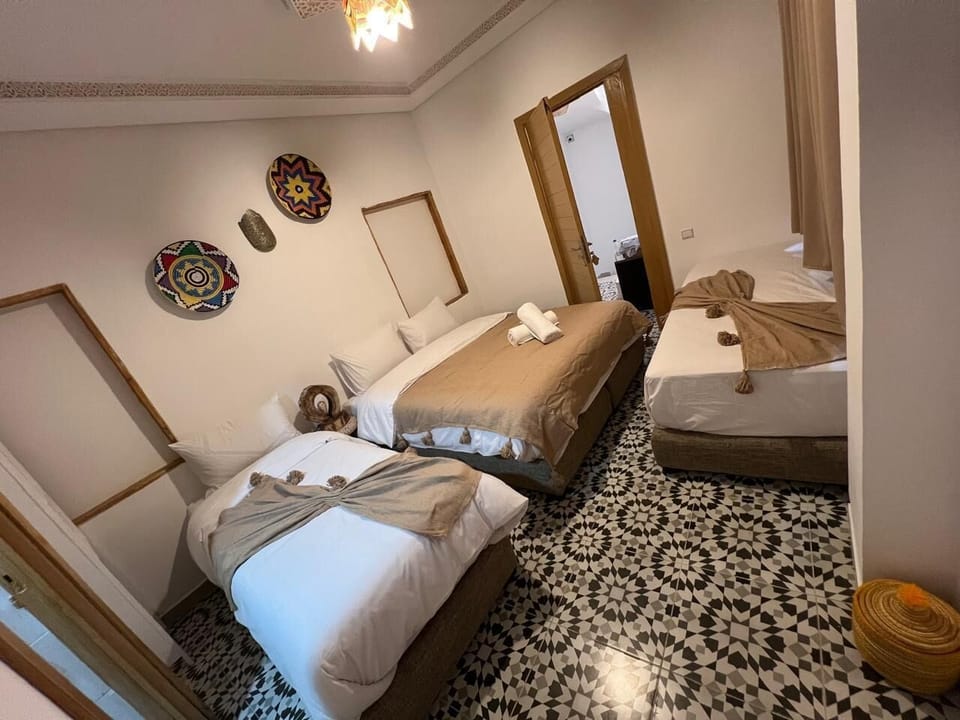 Comfort Quadruple Room | Laptop workspace, free WiFi