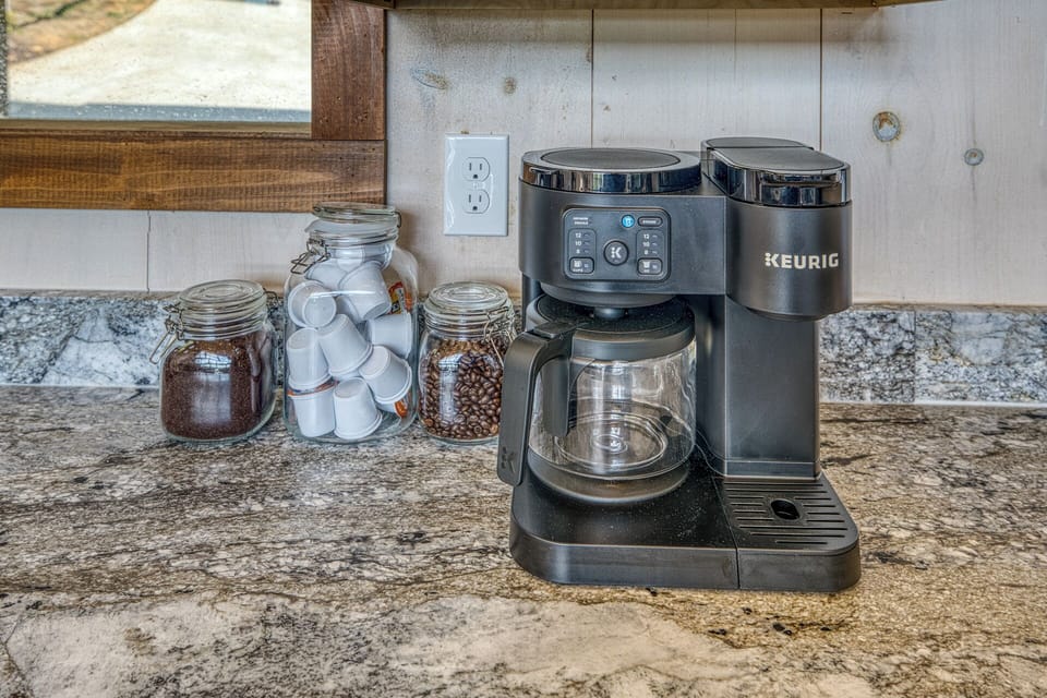 Start your mornings with fresh coffee and mountain views. The coffee station includes both drip coffee and single-serve options, making it easy for everyone to enjoy their favorite brew before heading out to explore downtown Blue Ridge, just 5 minutes away