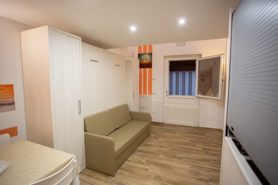 Family Studio, Kitchenette, Sea View | Minibar, in-room safe, blackout drapes, WiFi (free)