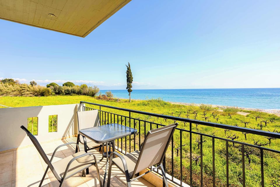 Shaded Balcony with Sea View and Outdoor Seating