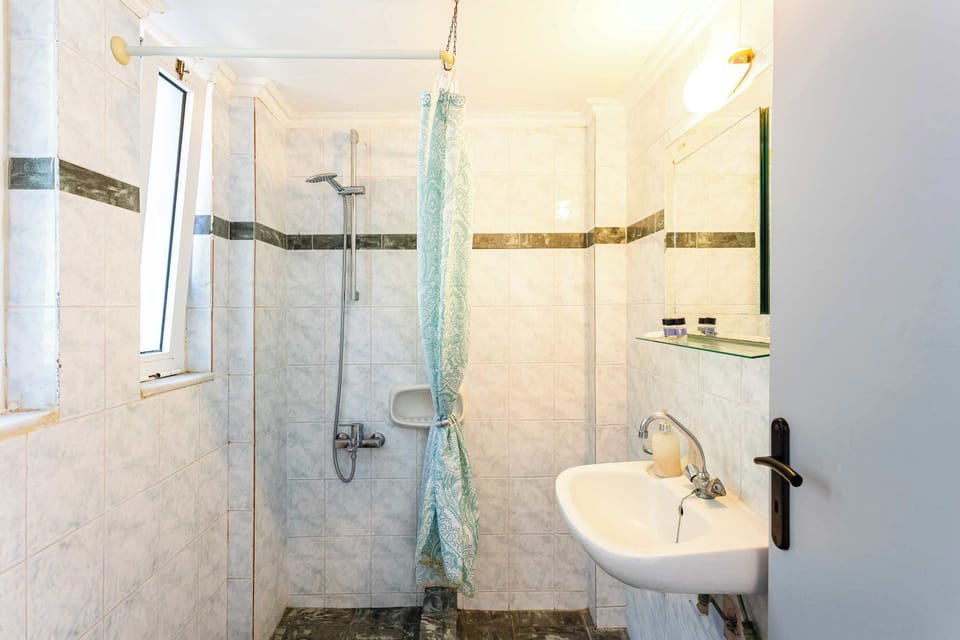 Modern Bathroom with Shower Cabin and Clean Design