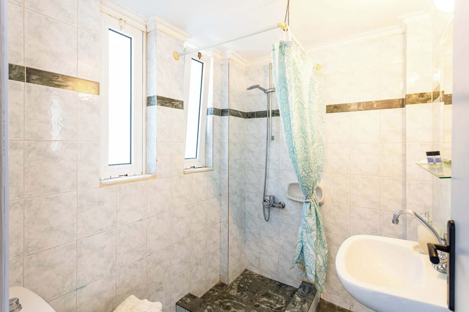 Bathroom with Walk-In Shower and Glass Enclosure