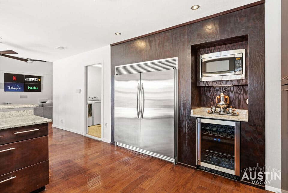 Built-in stainless steel fridge and wine cooler