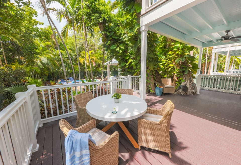 Dine al fresco on the sun-drenched patio, surrounded by nature’s beauty, where every meal feels like a celebration under the Florida sun.