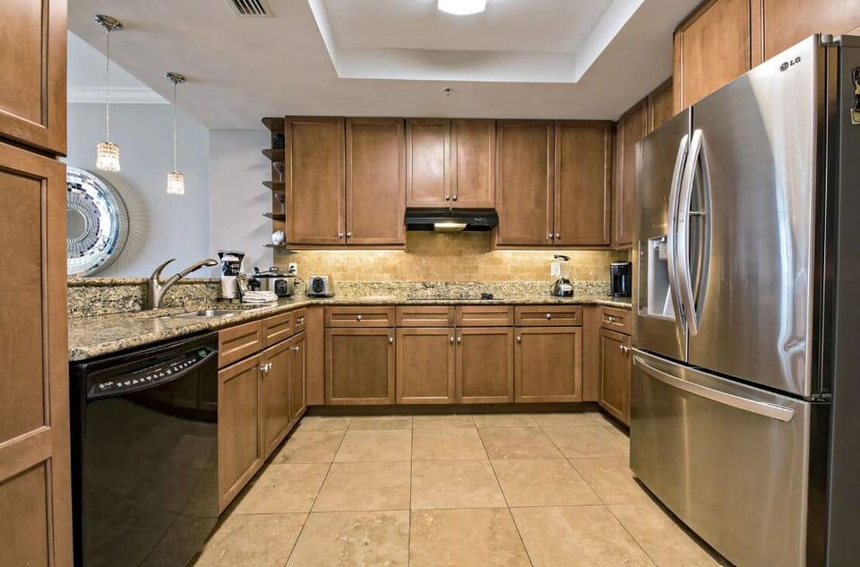 Condo, Multiple Beds (Indigo West 502) | Private kitchen | Oven, toaster