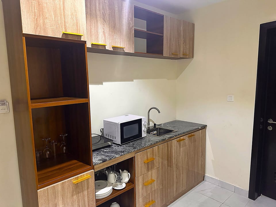 Presidential Suite, Patio, City View | Private kitchen | Mini-fridge