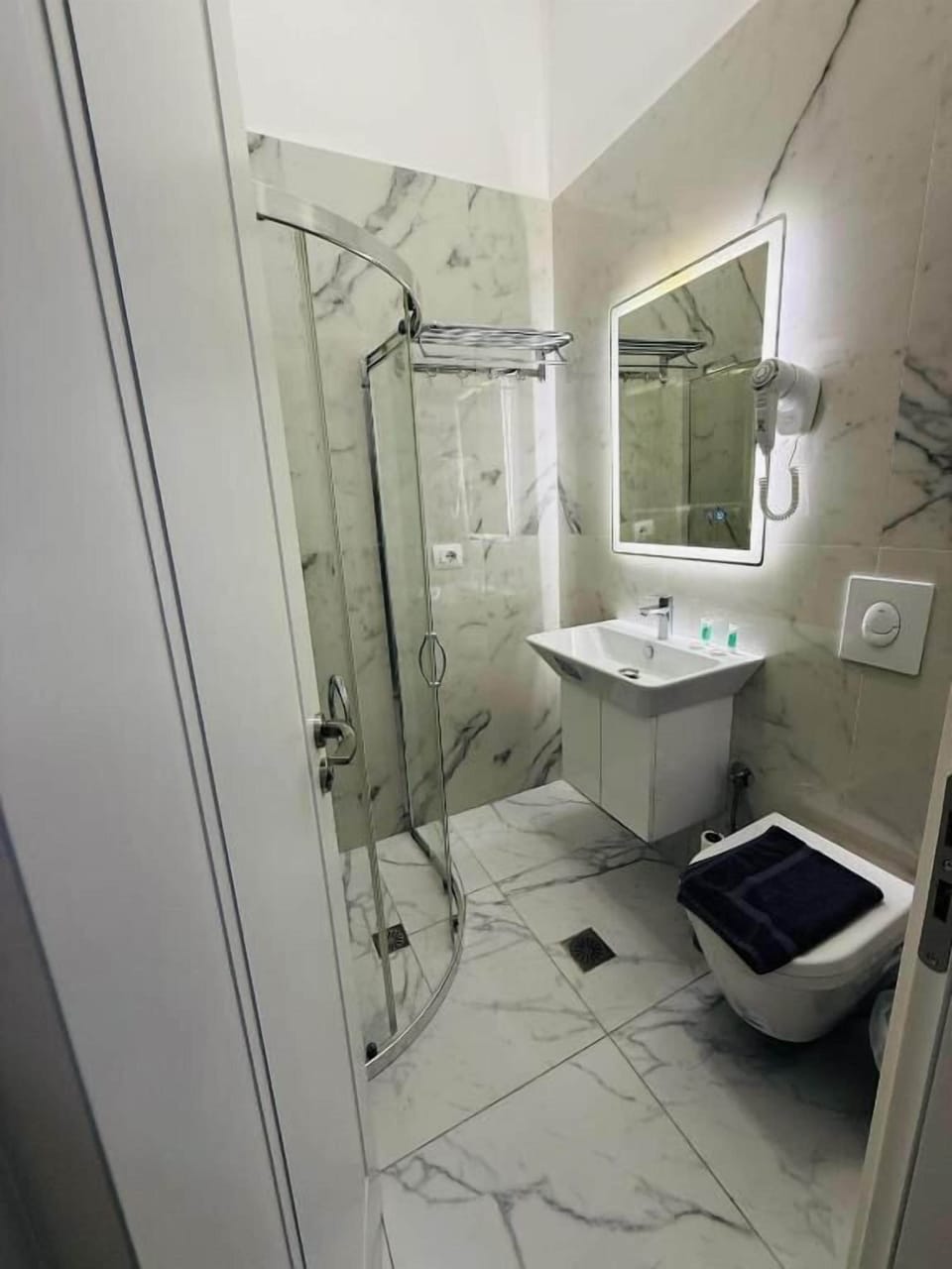 Free toiletries, hair dryer, slippers, towels