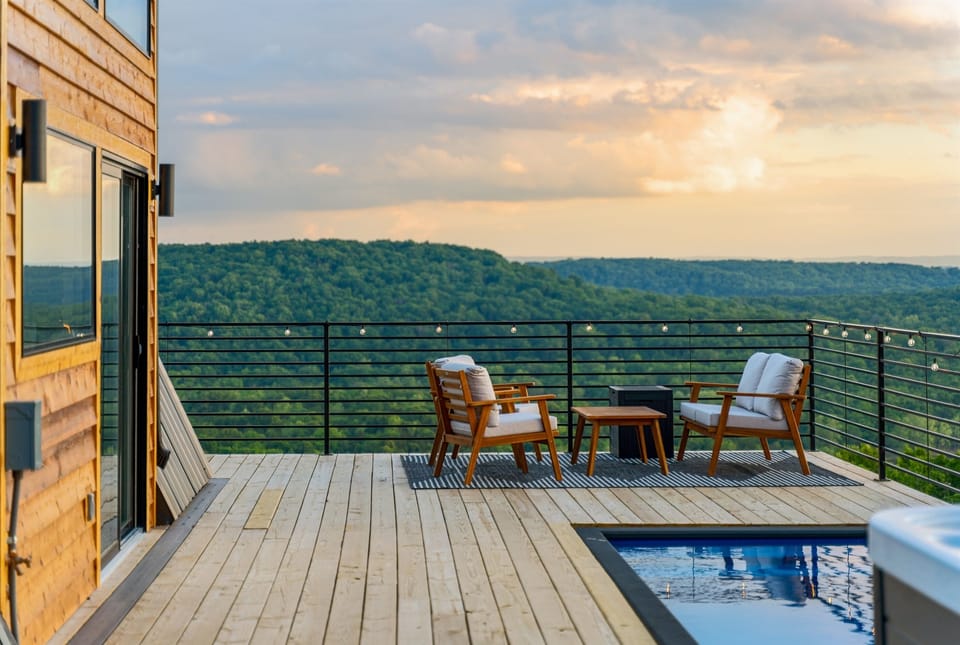A perfect blend of comfort and scenery with Adirondack seating and poolside relaxation.
