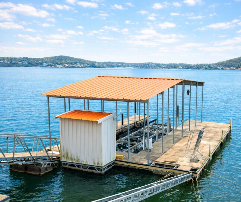 Private covered boat dock with swim access—perfect for boating, fishing, and lakeside vacation fun.
