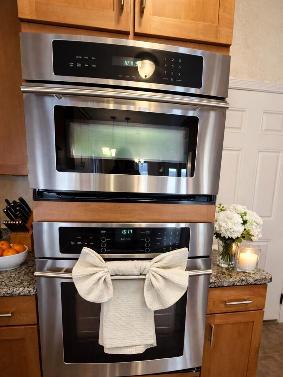 Gourmet kitchen with stainless steel double ovens—perfect for baking, entertaining, and home-cooked meals during your vacation stay.