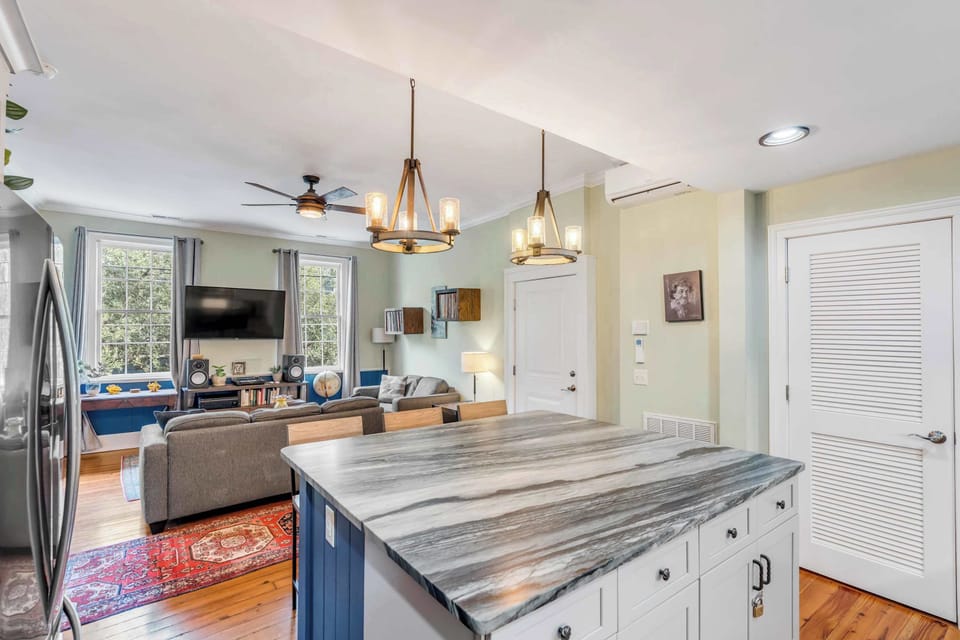 View of the kitchen island and living room