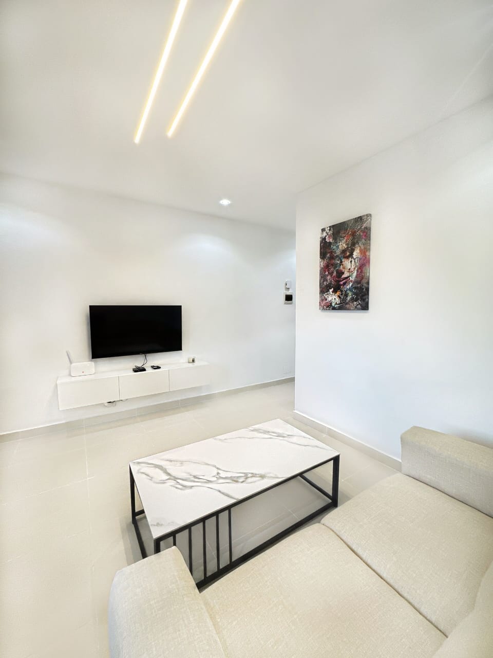 50-inch flat-screen TV with cable channels, pay movies