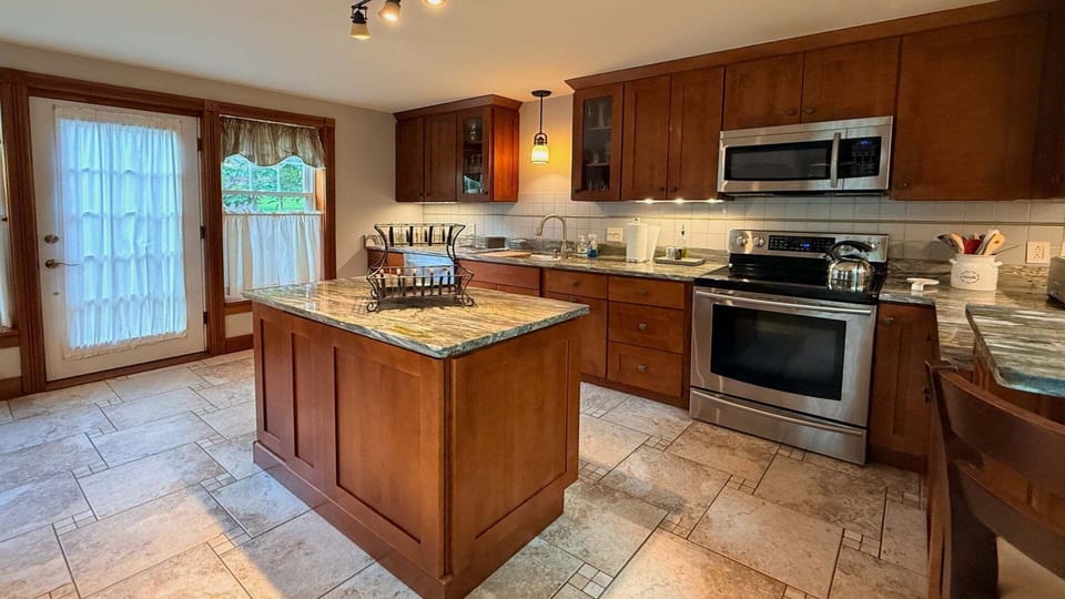 Kitchen with all stainless appliances