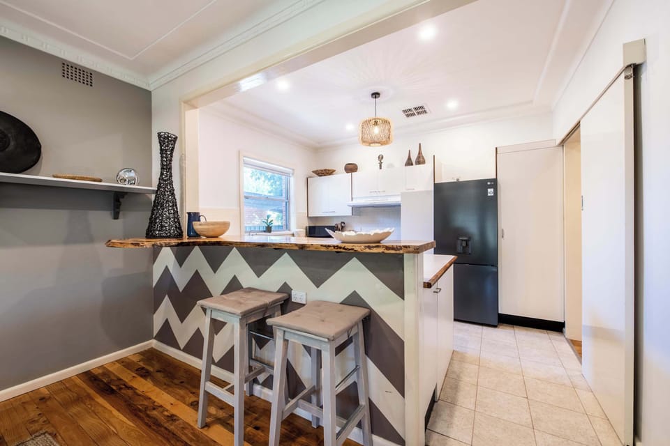 Kitchen + Coffee Machine + Breakfast Bar & Stools