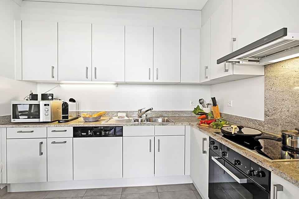 Family Apartment, Multiple Bedrooms, 2 Bathrooms (Locarno Centro Apartment) | Private kitchen | Fridge, microwave, oven, stovetop
