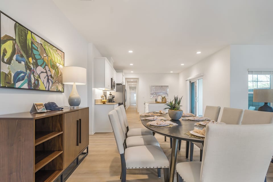 Experience the flow of modern living with a direct view from the dining room to the kitchen.