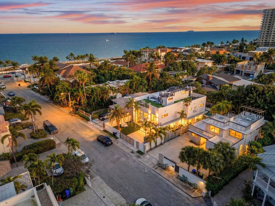 Skyline-to-sea views at golden hour—Fort Lauderdale living just steps from the beach.