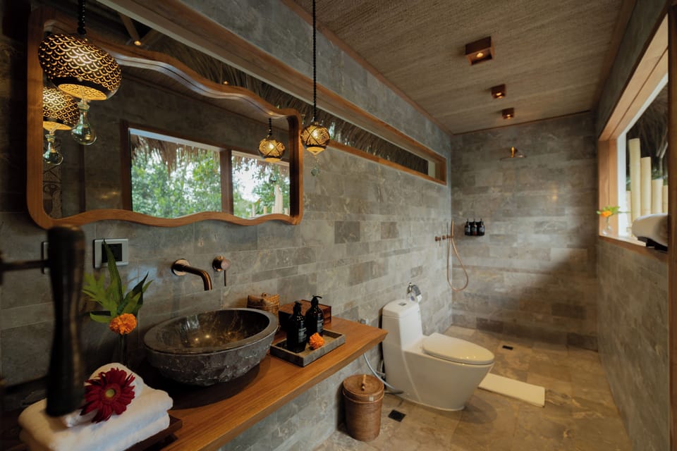 Separate tub and shower, free toiletries, hair dryer, slippers