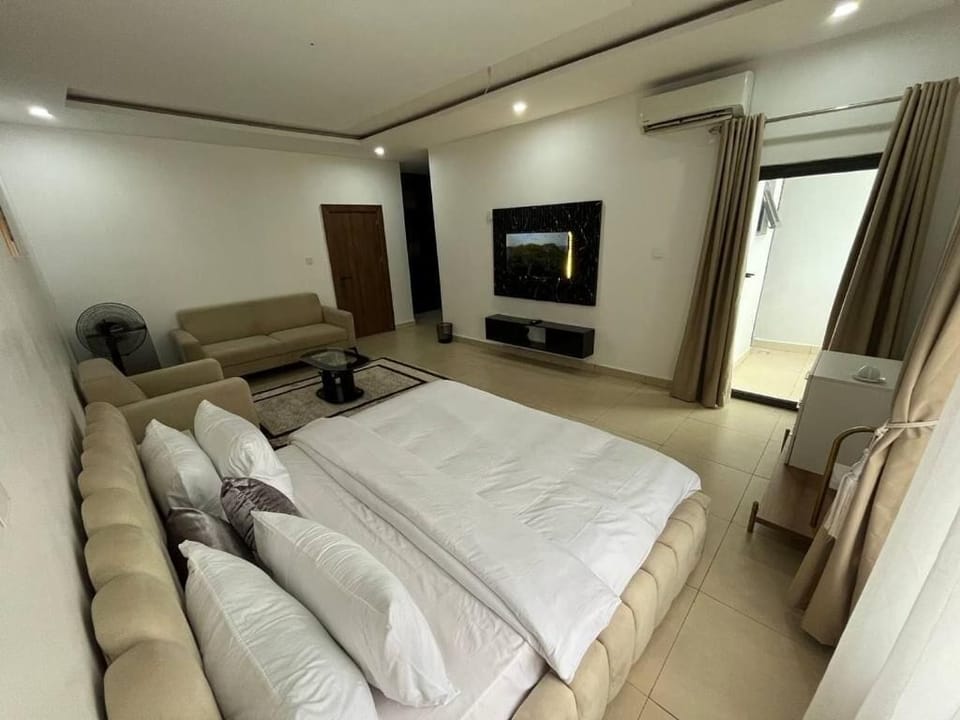 Family Room, Balcony, City View | Desk, laptop workspace, blackout drapes, soundproofing