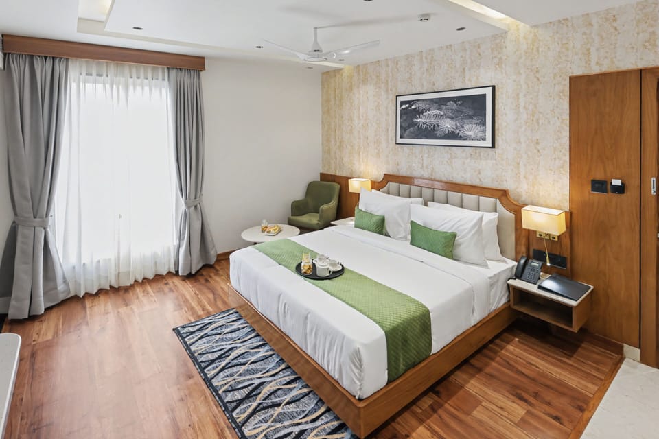 Classic Double Room, City View | Desk, laptop workspace, soundproofing, iron/ironing board