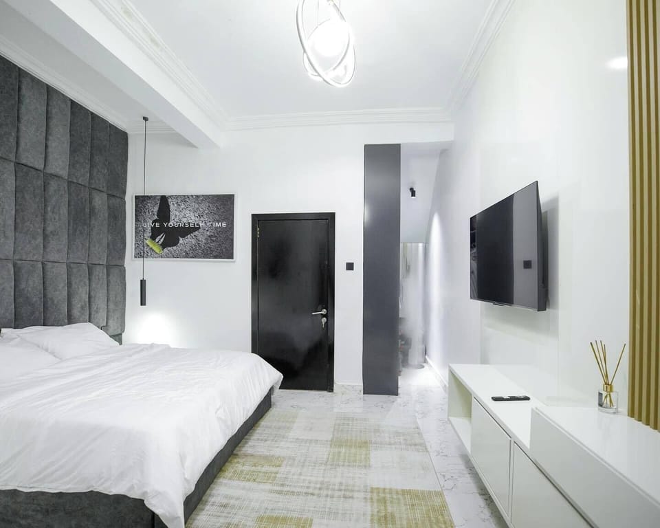 Family Room, Balcony, City View | Desk, laptop workspace, blackout drapes, soundproofing