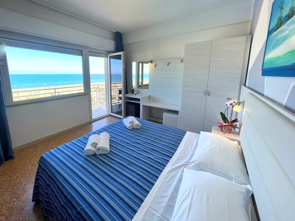 Panoramic Quadruple Room, Balcony, Sea View | In-room safe, desk, free WiFi