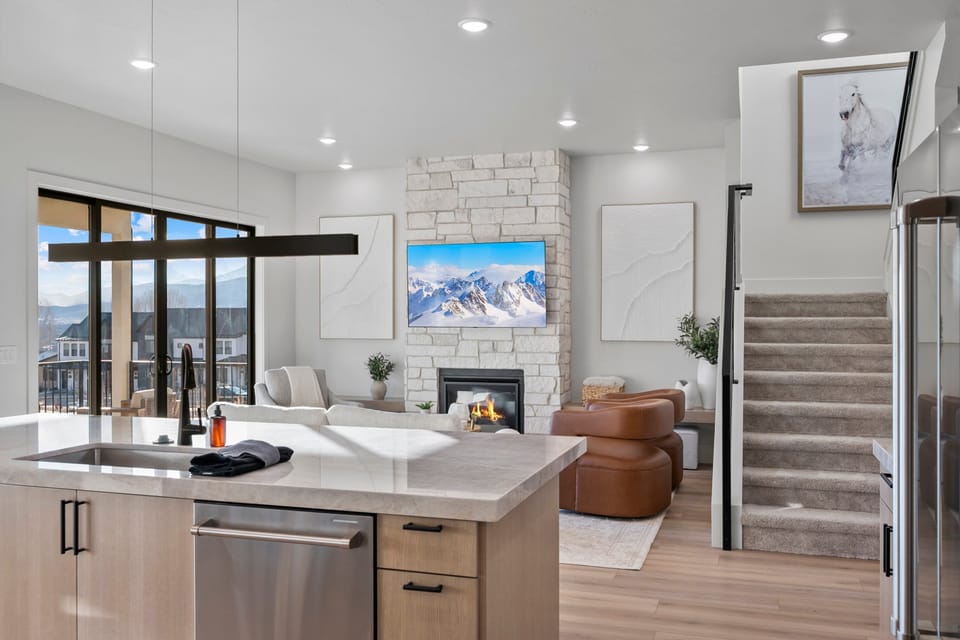Custom furnishings and designer elements yet cozy warm feel in the primary living room