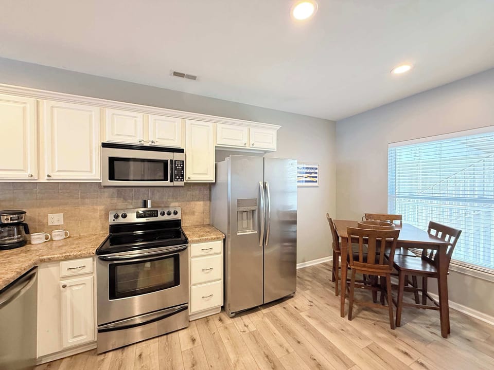 Make mealtime memories together at the dining table, seating 4​