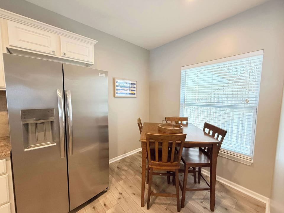 Make mealtime memories together at the dining table, seating 4​