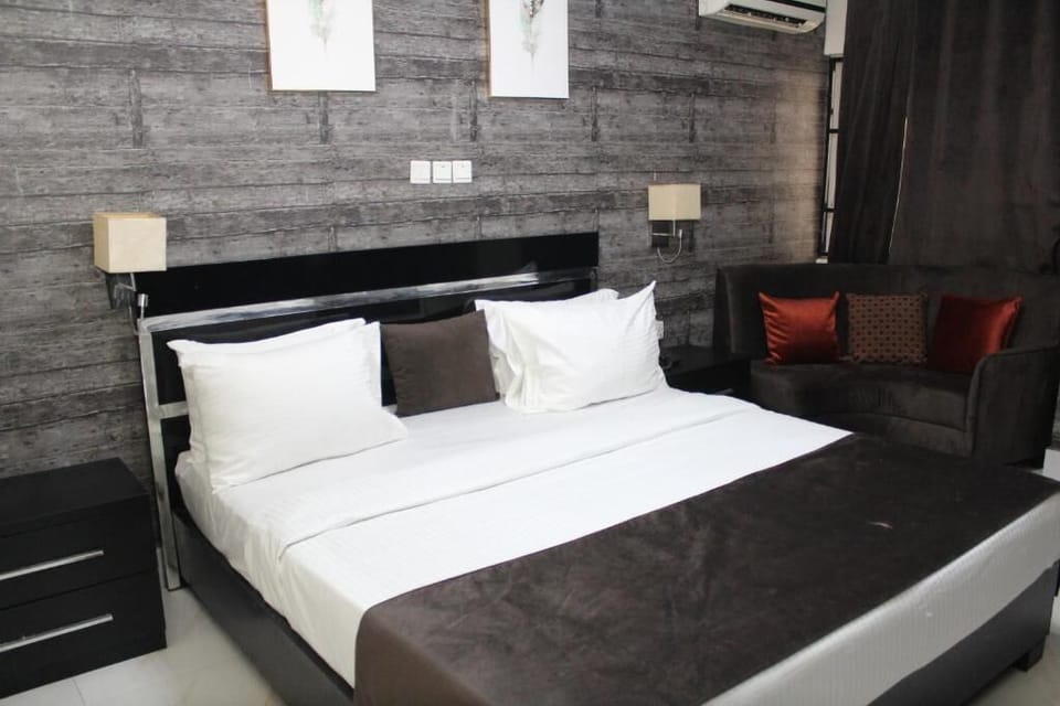 Deluxe Room, Balcony, City View | Desk, laptop workspace, blackout drapes, soundproofing
