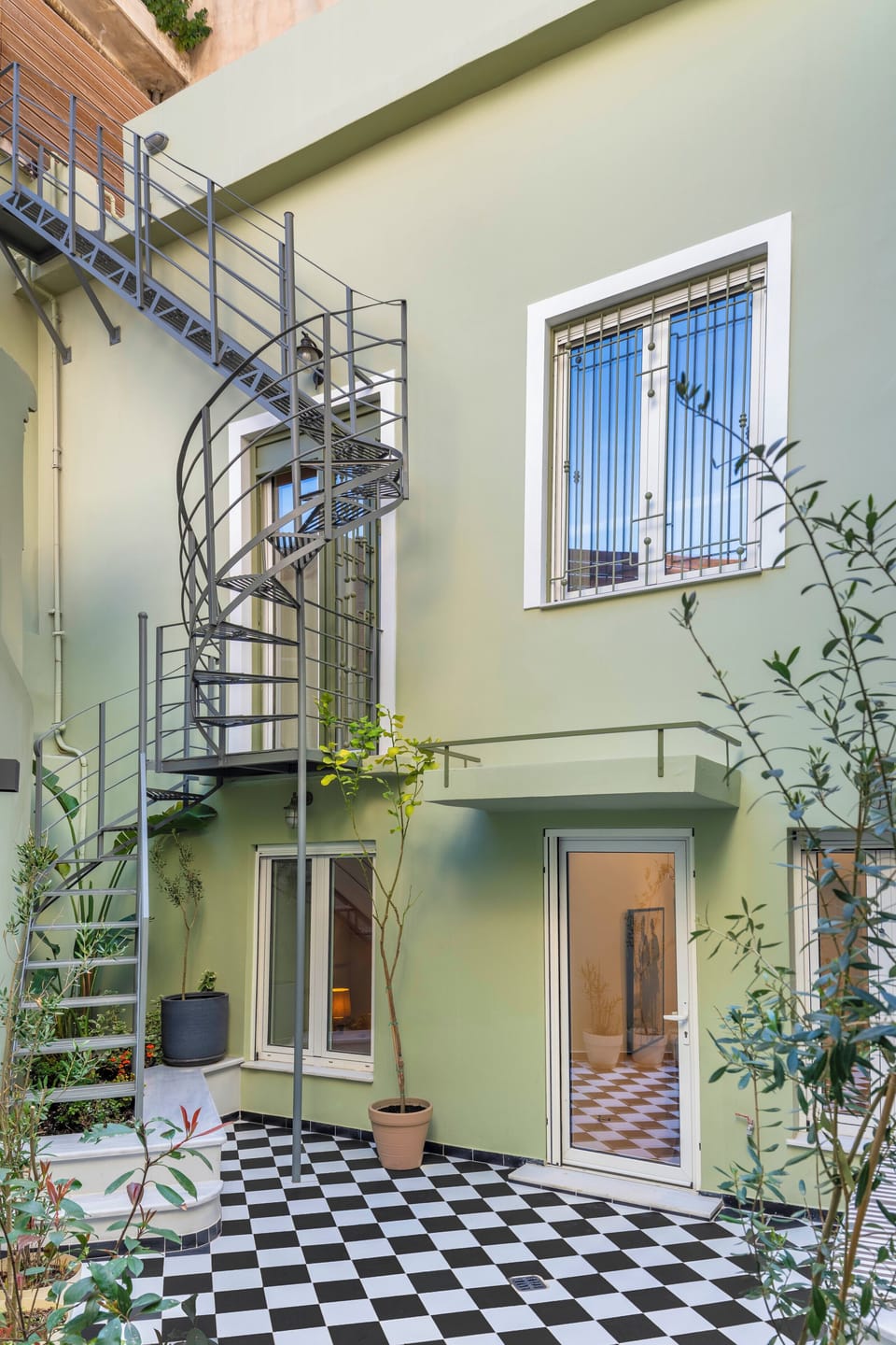 Out door steps from main level to the court yard with heated plunge pool.