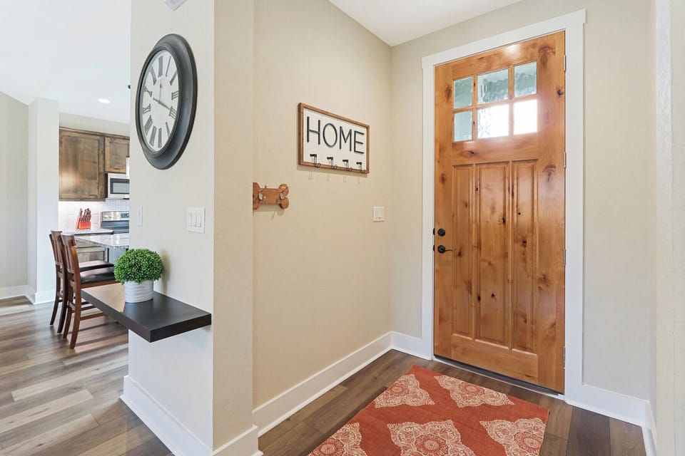 Welcoming entryway with a spot for your furry friends - Mint Julep