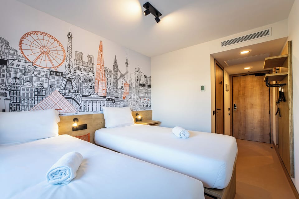 Twin Room | Memory foam beds, desk, laptop workspace, blackout drapes
