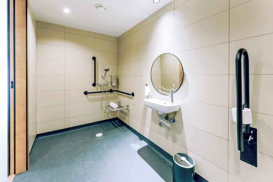Accessible Double Room | Bathroom | Shower, rainfall showerhead, eco-friendly toiletries