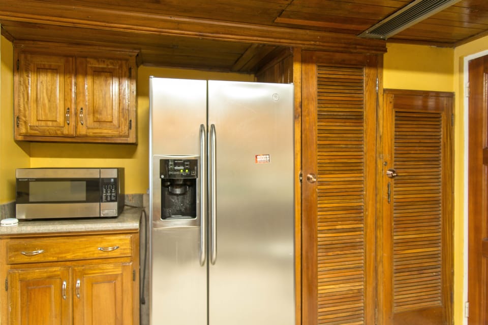 Standard Apartment | Private kitchen | Coffee/tea maker, full-size fridge, stovetop