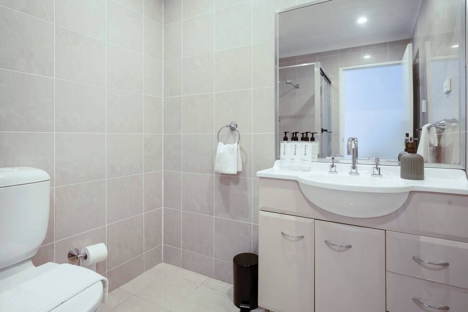 Refresh in the second bathroom, thoughtfully designed for comfort and convenience.