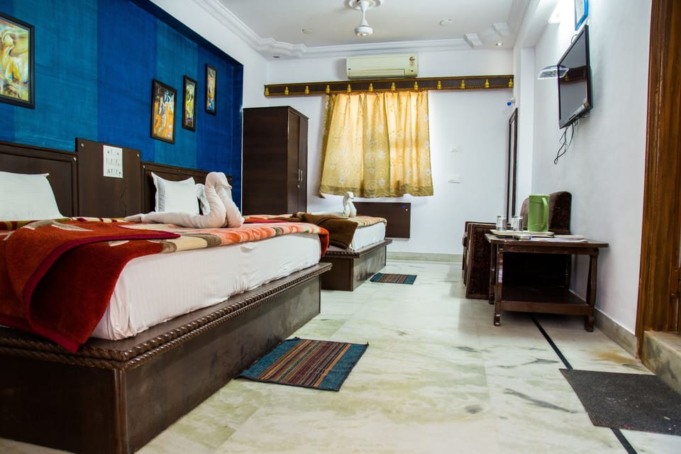 Big Family Four Bedded Room | Rollaway beds, free WiFi, bed sheets