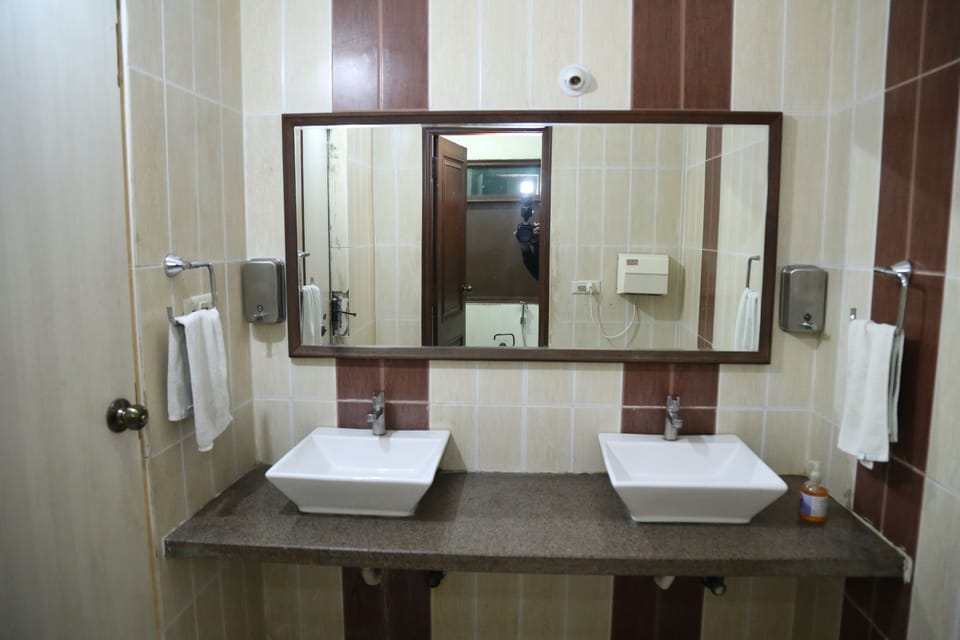 Shower, free toiletries, slippers, towels