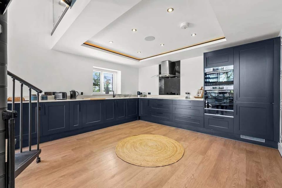 Enjoy home-cooked meals with family in the fully equipped kitchen and dining area at Blue Puffin Stays. Cook, dine, and make memories together in a space designed for comfort, convenience, and quality time.