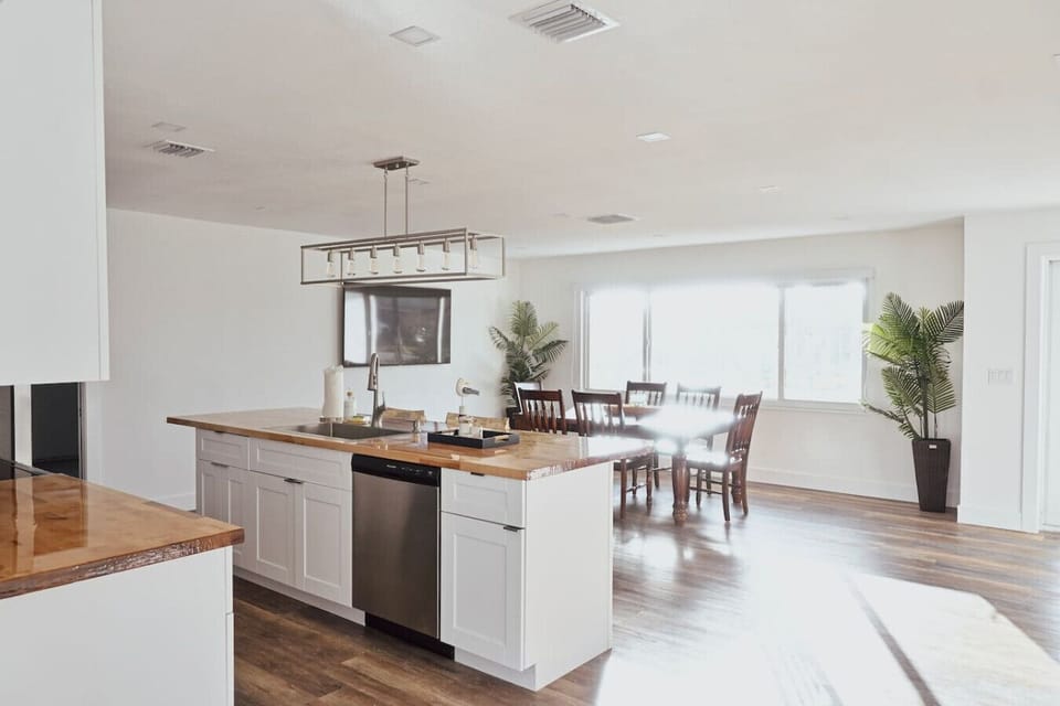 Looking into the kitchen and dining room from the living room.