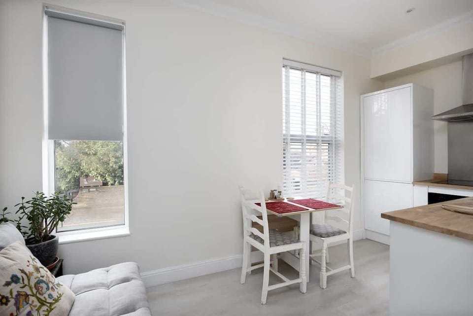 Whip up your favorite meals in this bright, all-white kitchen. Compact yet fully equipped with modern appliances. Perfect for cozy breakfasts, home-cooked dinners, or a coffee break in style.