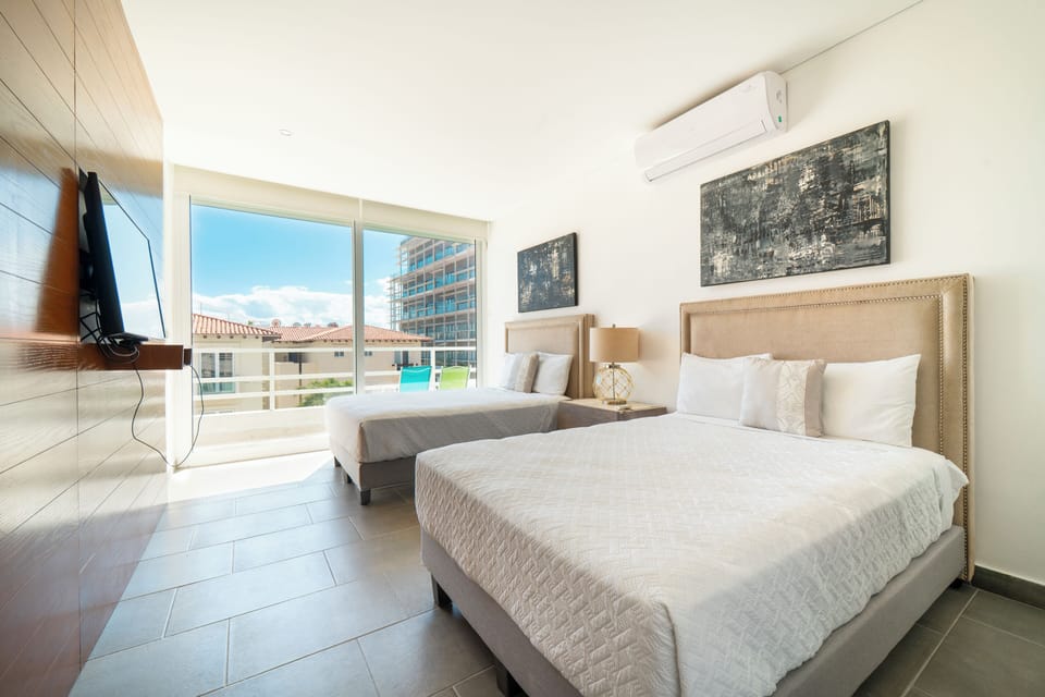 Deluxe Condo, Balcony | In-room safe, free WiFi